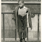 Boy with Arms Around Gate, Bedford-Stuyvesant, c1949